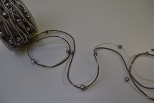 Band 10m/ 10mm, Schnüre m. Kugeln, taupe Band 10m/ 10mm, Schnüre m. Kugeln, taupe