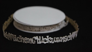 Band 10y/ 16mm, Glückwunsch 70x klebend, weiss Band 10y/ 16mm, Glückwunsch 70x klebend, weiss