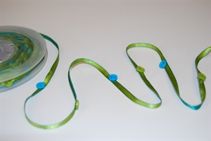 Band 10m/ 4mm, Knopf an Band, grün Band 10m/ 4mm, Knopf an Band, grün